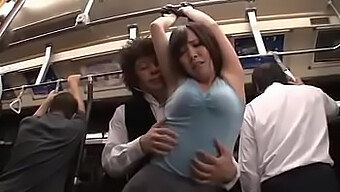 Japanese Couple Engages In Intimate Acts On A Bus